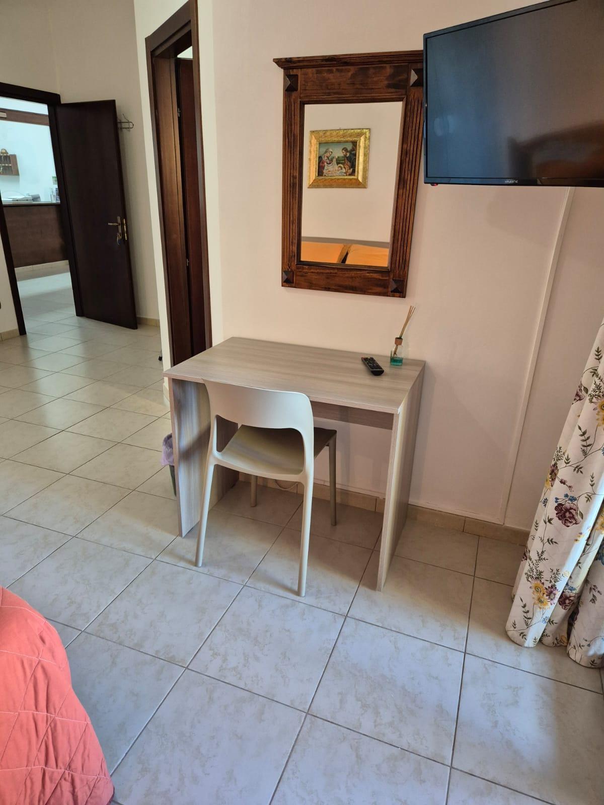 tripla con terrazzo e cucina