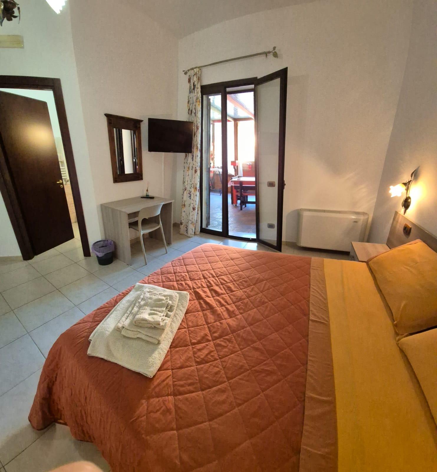 tripla con terrazzo e cucina