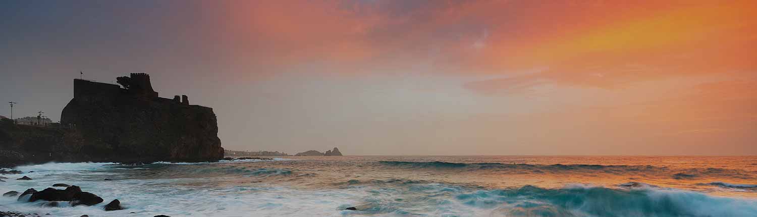 Aci Castello - Il Castello al tramonto